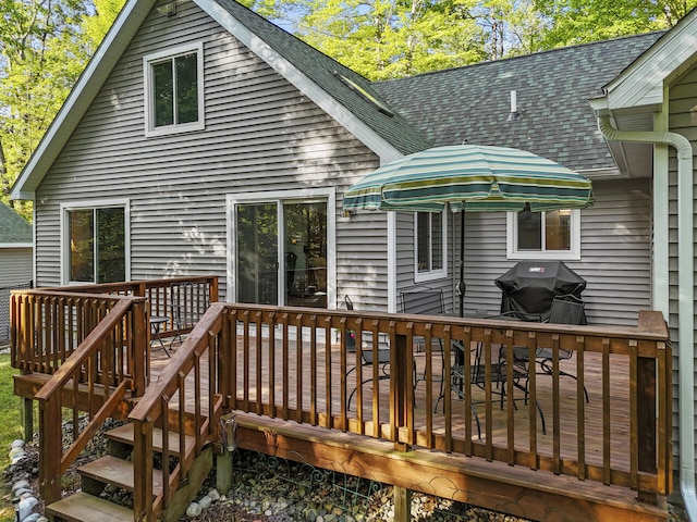 wooden deck with grilling area