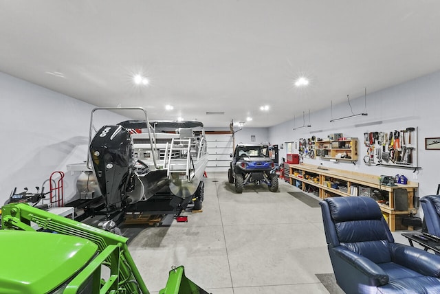 garage with a workshop area