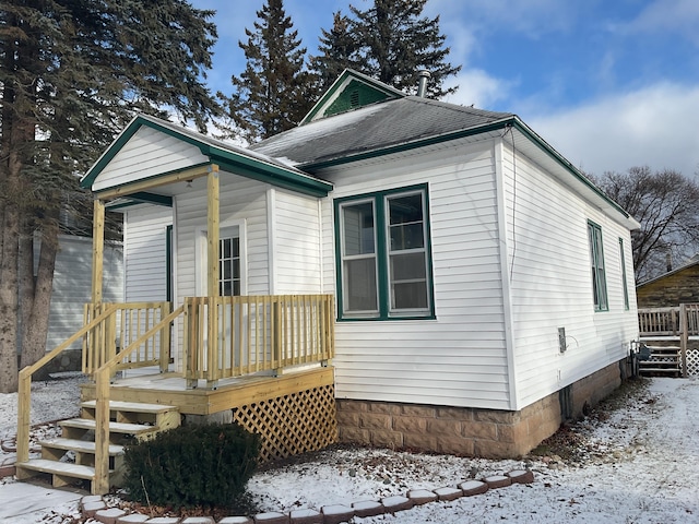 view of front facade featuring a deck