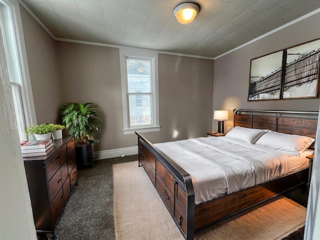 bedroom featuring carpet floors and ornamental molding