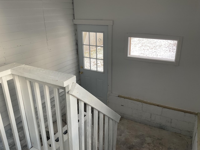 stairs with concrete floors