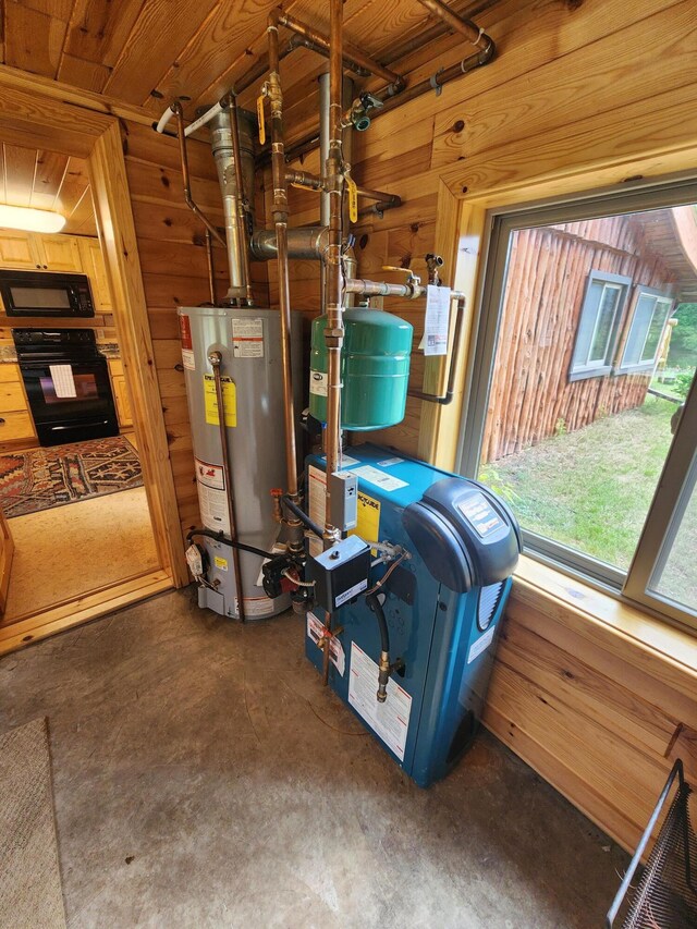 utility room with gas water heater