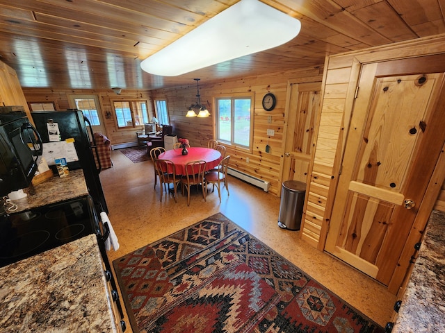 dining area featuring a chandelier, wooden walls, wood ceiling, and baseboard heating