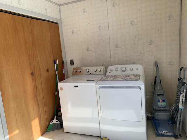 laundry room with laundry area and separate washer and dryer