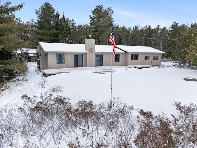 view of snow covered property