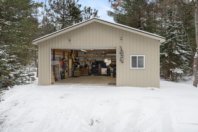 view of snow covered garage