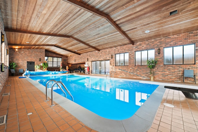 view of pool featuring a diving board