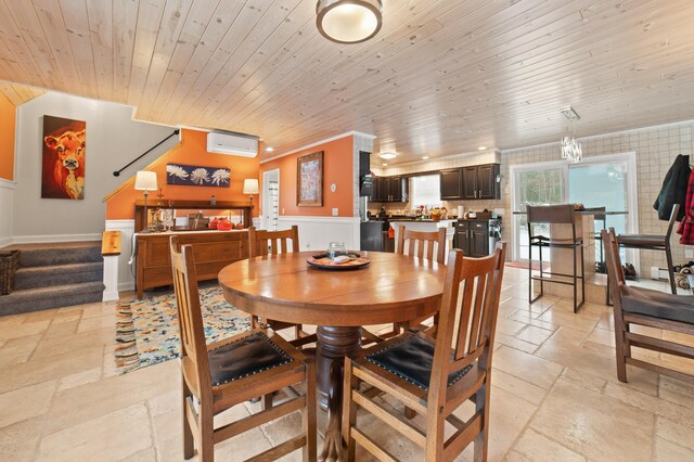 dining space featuring an AC wall unit, crown molding, and wooden ceiling