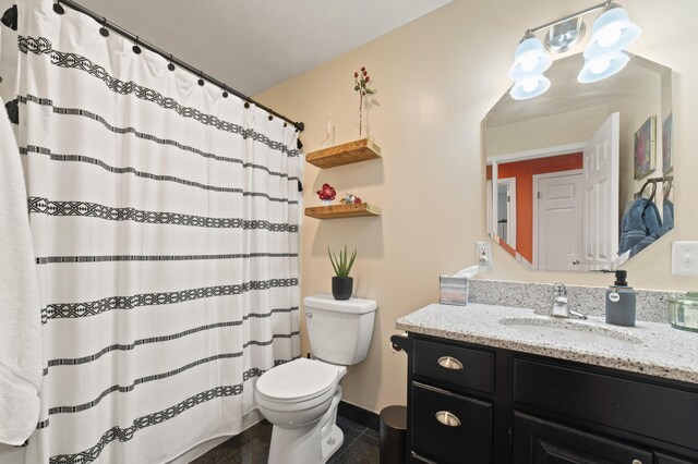 bathroom with tile walls, toilet, a baseboard heating unit, vanity, and crown molding