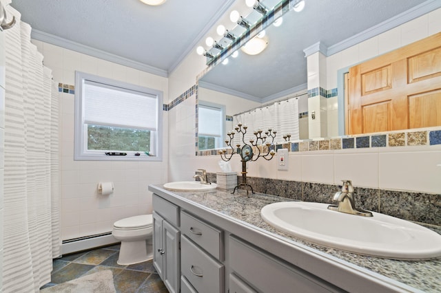 full bath featuring a sink, ornamental molding, baseboard heating, and tile walls