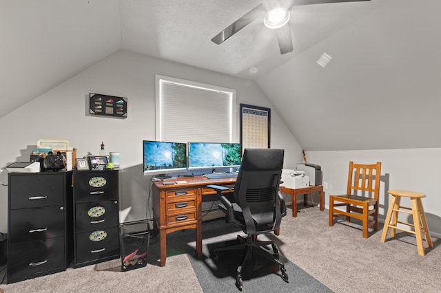 office space with ceiling fan, carpet, and vaulted ceiling