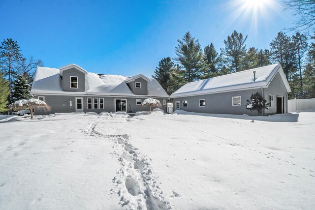 view of snow covered garage