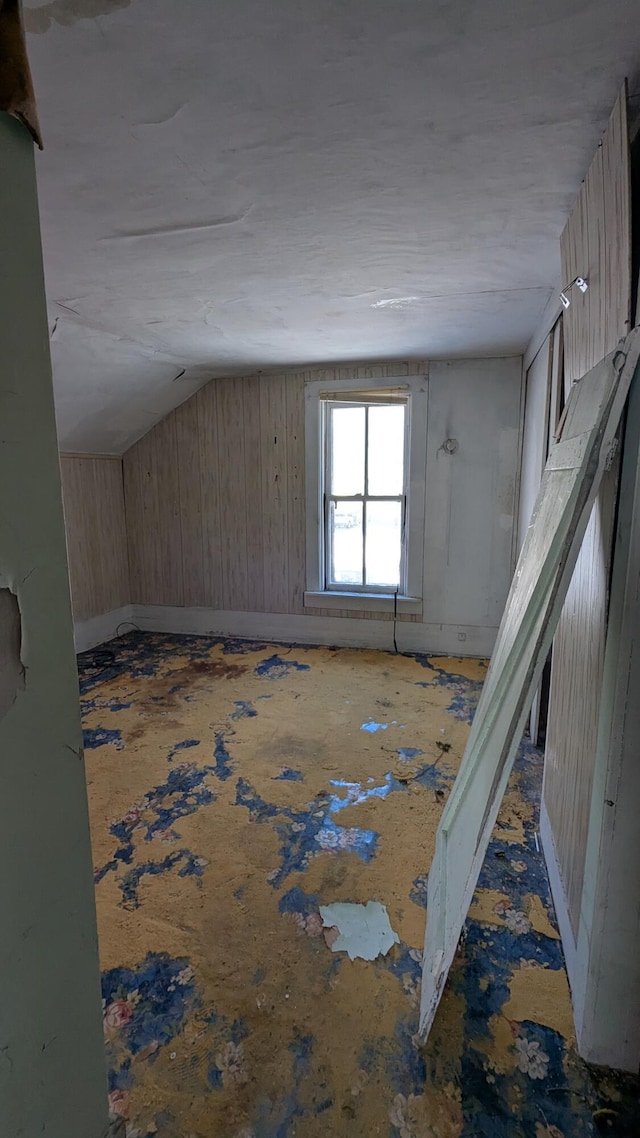 bonus room with vaulted ceiling