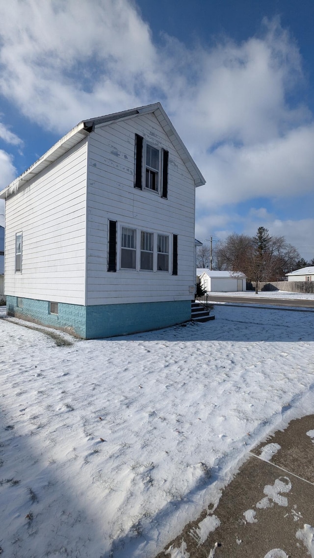 view of snow covered property