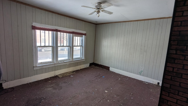 unfurnished room with ceiling fan