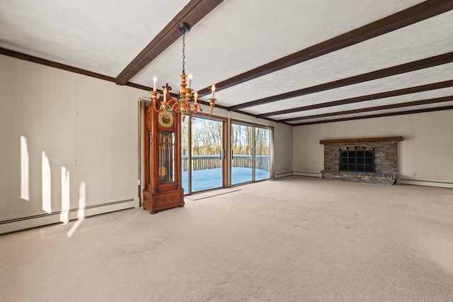 unfurnished living room featuring carpet, beam ceiling, a textured ceiling, and a brick fireplace