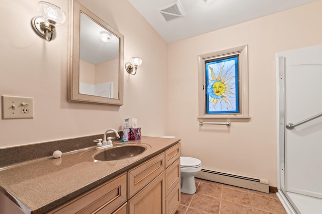 bathroom with vanity, toilet, and baseboard heating