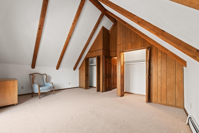 bonus room with a baseboard heating unit, lofted ceiling with beams, light colored carpet, and wooden walls