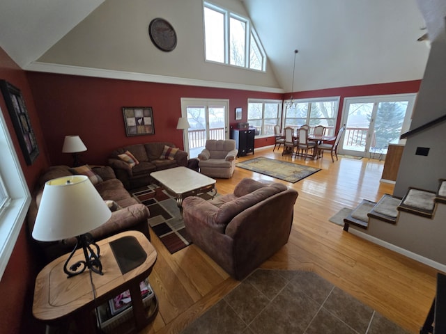 living room featuring hardwood / wood-style flooring and a high ceiling