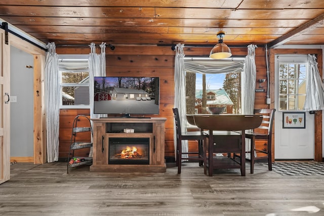 bar with wood ceiling and hardwood / wood-style flooring