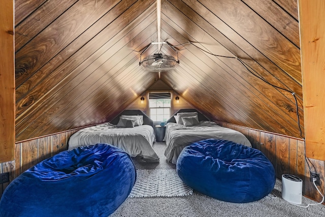 carpeted bedroom featuring wooden ceiling, lofted ceiling, and wood walls