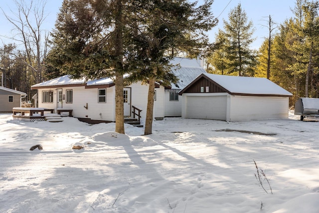 view of front of property with an outbuilding and a garage