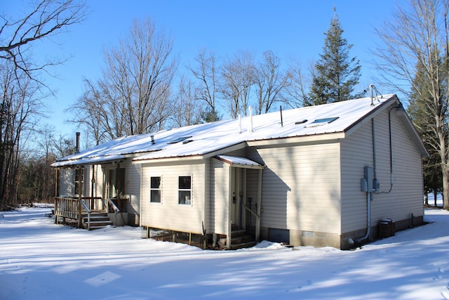 view of snow covered property