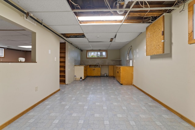 basement with a drop ceiling