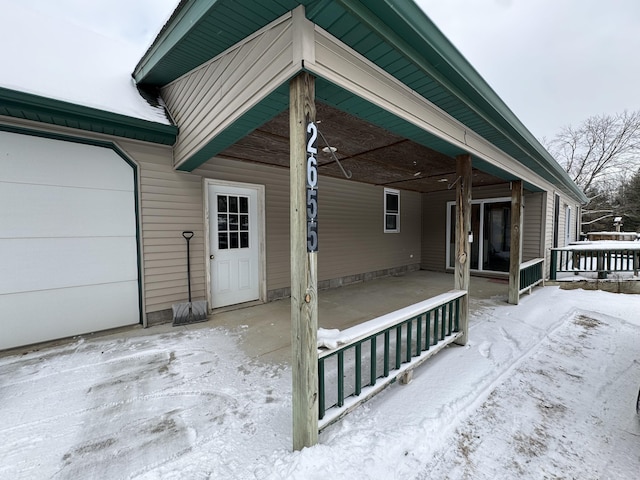 view of snow covered patio