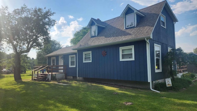 view of property exterior featuring a yard