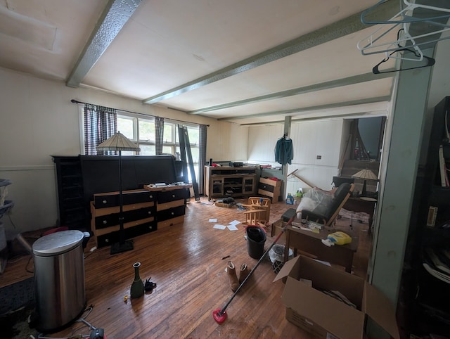 living room featuring hardwood / wood-style floors and beam ceiling