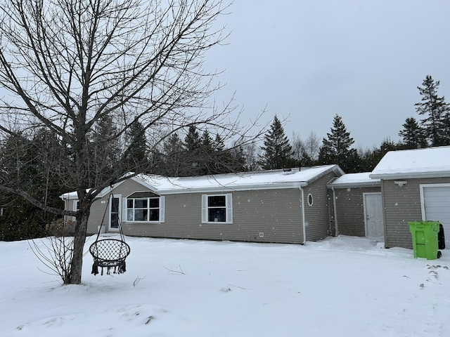 view of snow covered property