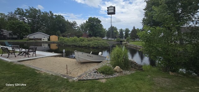 view of patio / terrace with a water view