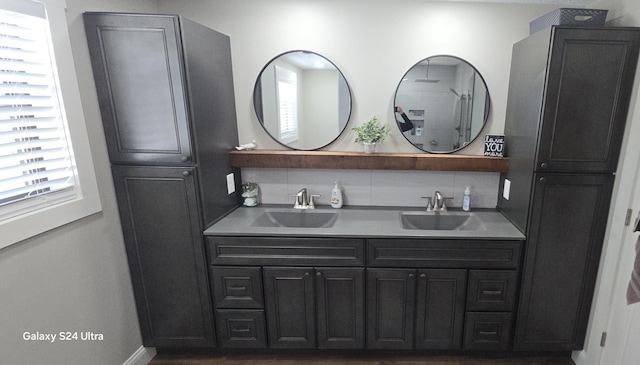 bathroom with a wealth of natural light and vanity