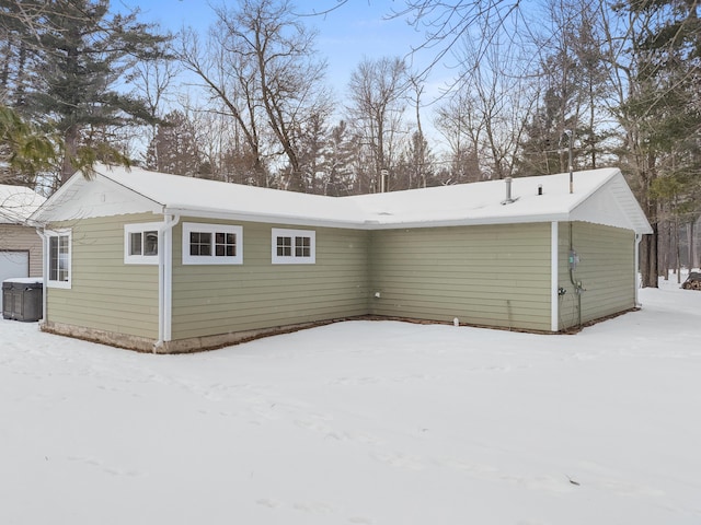 view of snow covered property