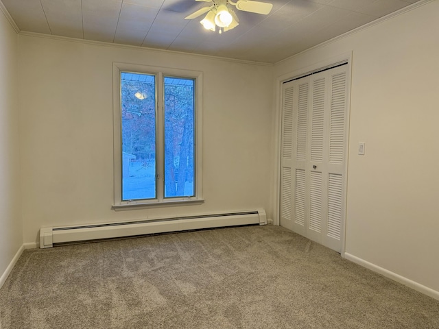 unfurnished bedroom with ceiling fan, a baseboard heating unit, light carpet, and ornamental molding