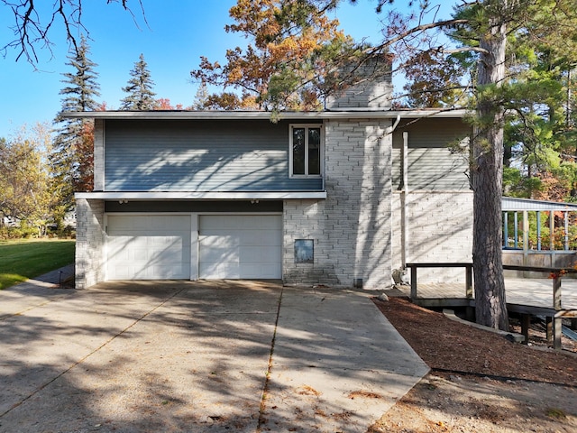 exterior space with a garage