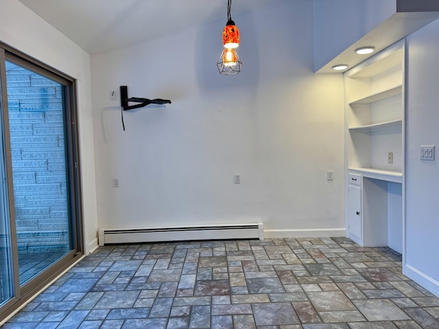 unfurnished dining area with a baseboard radiator