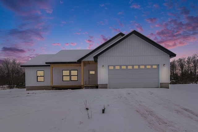 modern farmhouse style home with an attached garage