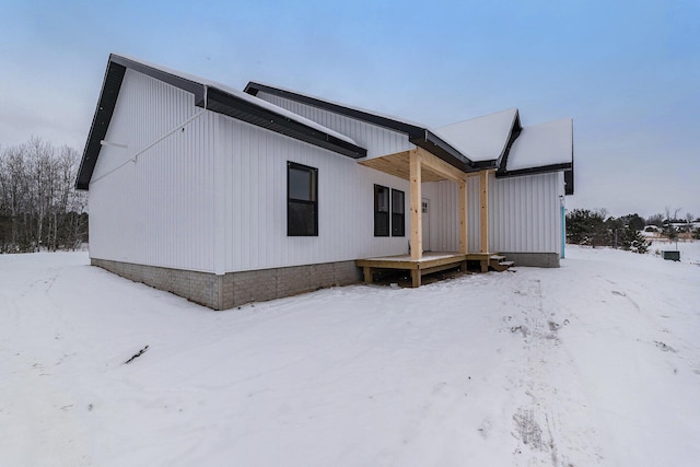 view of snow covered property