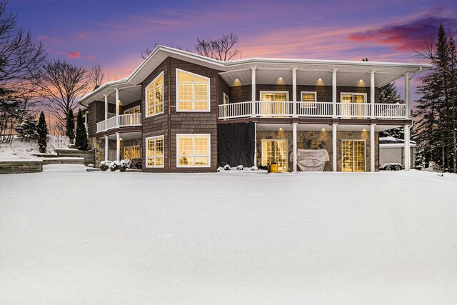 view of snow covered house