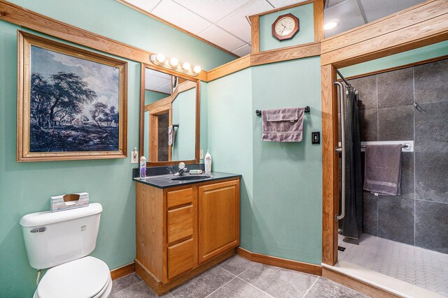 playroom with a paneled ceiling, sink, pool table, and a fireplace