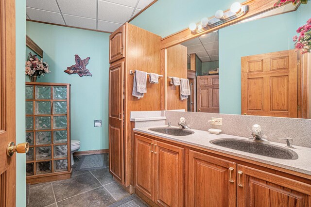 carpeted bedroom with a drop ceiling, access to outside, and ceiling fan