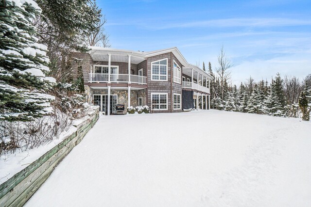 view of snow covered deck