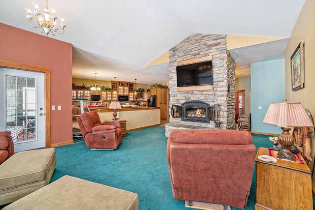 carpeted living room with a chandelier and vaulted ceiling