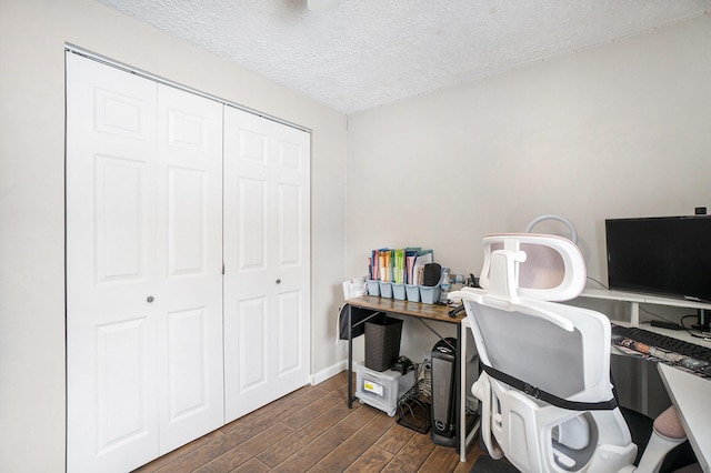 office space with a textured ceiling