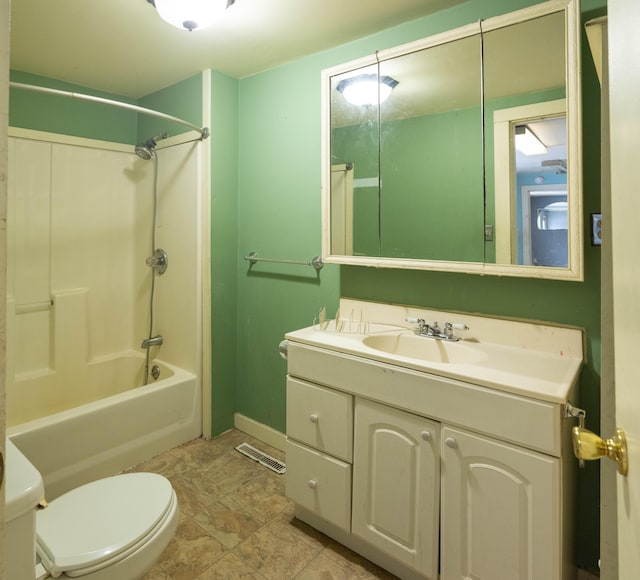 full bathroom with vanity, bathing tub / shower combination, and toilet