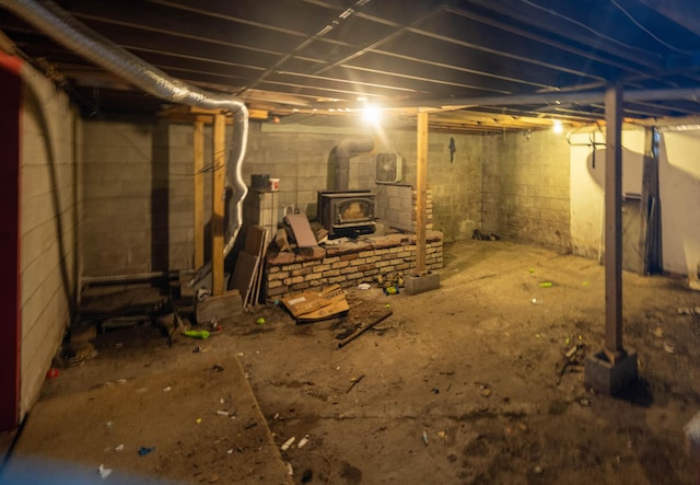 basement featuring a wood stove