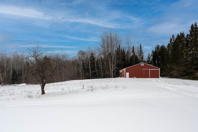 view of yard layered in snow