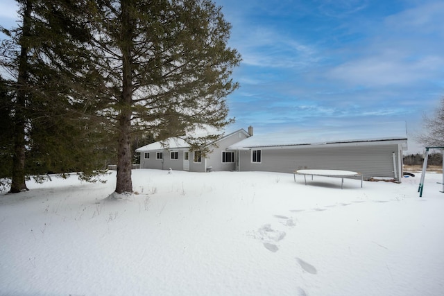 view of snow covered property